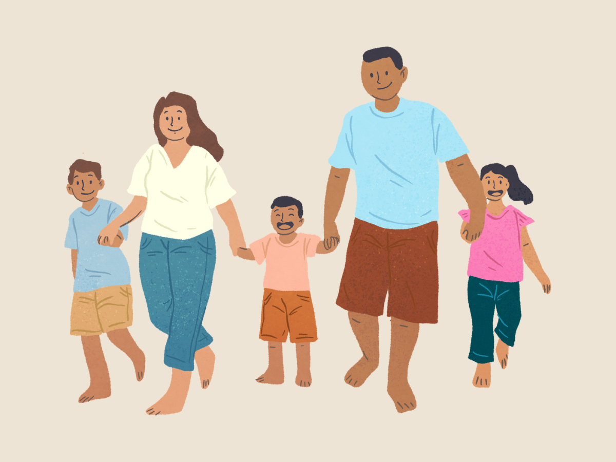 Family walking while holding hands