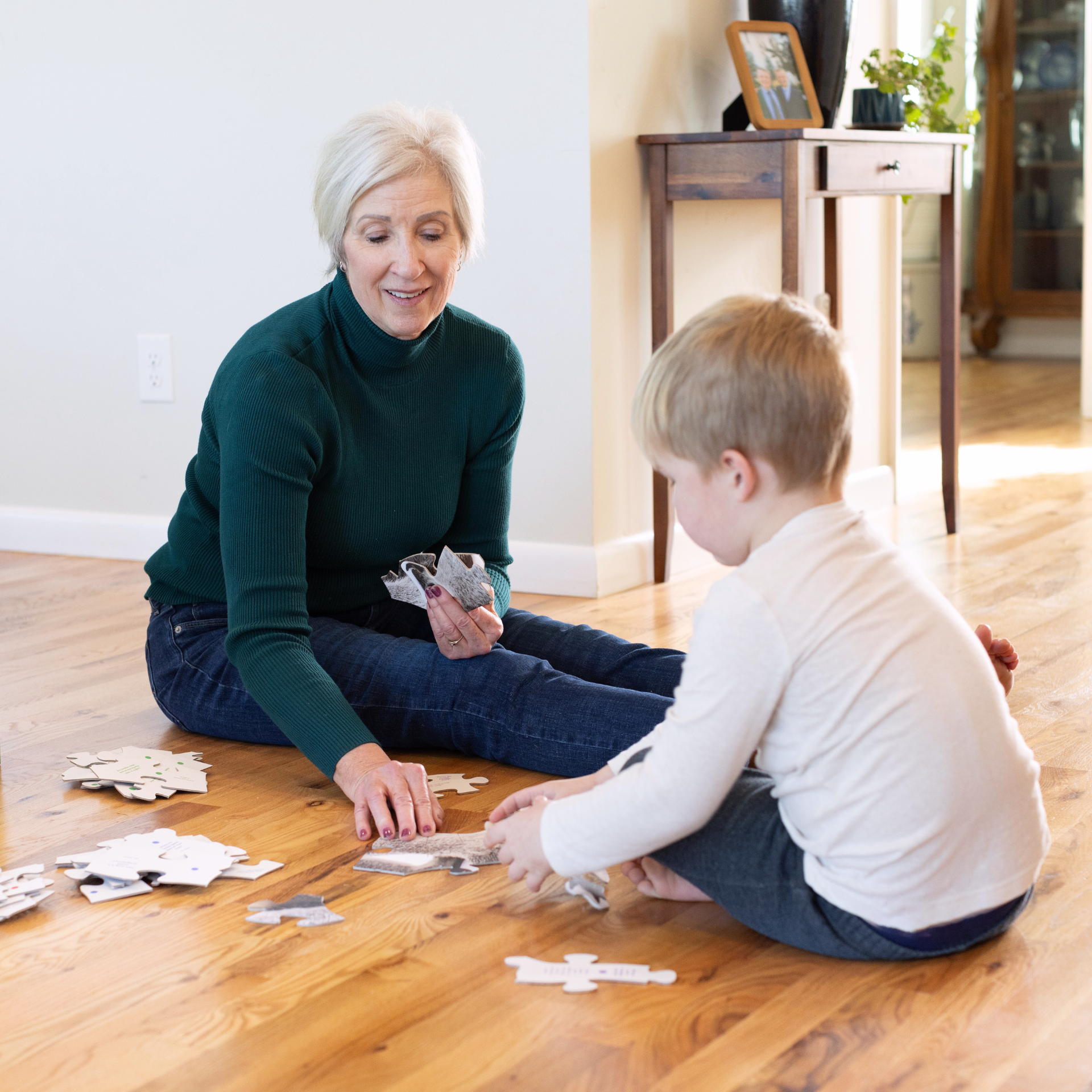 Grandma and Grandson doing a Large as Life Trivia Puzzle together