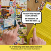 Jigsaw puzzle with a dad joke theme, hands pointing to text on a yellow sheet.
