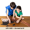 Two children working on a large red panda puzzle at a table.