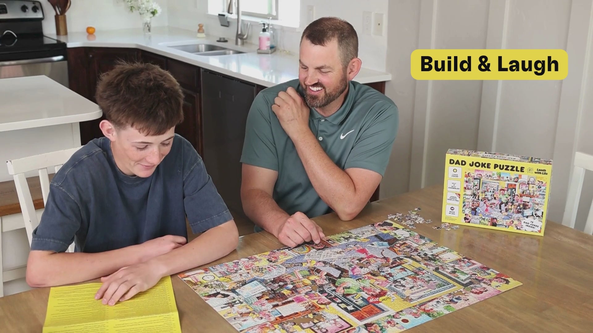 Dad Joke Puzzle video showing a dad and son building the puzzle and laughing